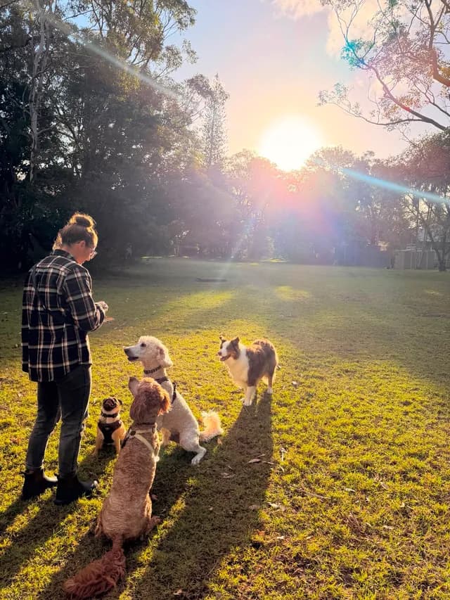 Anna with two of her dogs in Byron Bay